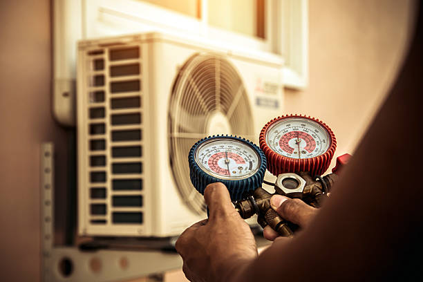 Professional Hvac technician working in Chestnut Hill, MA